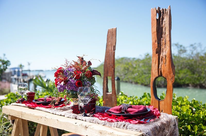 Vampire Wedding Table By The Water With Flowers