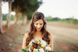 Autumn Bride Holding Flowers Face