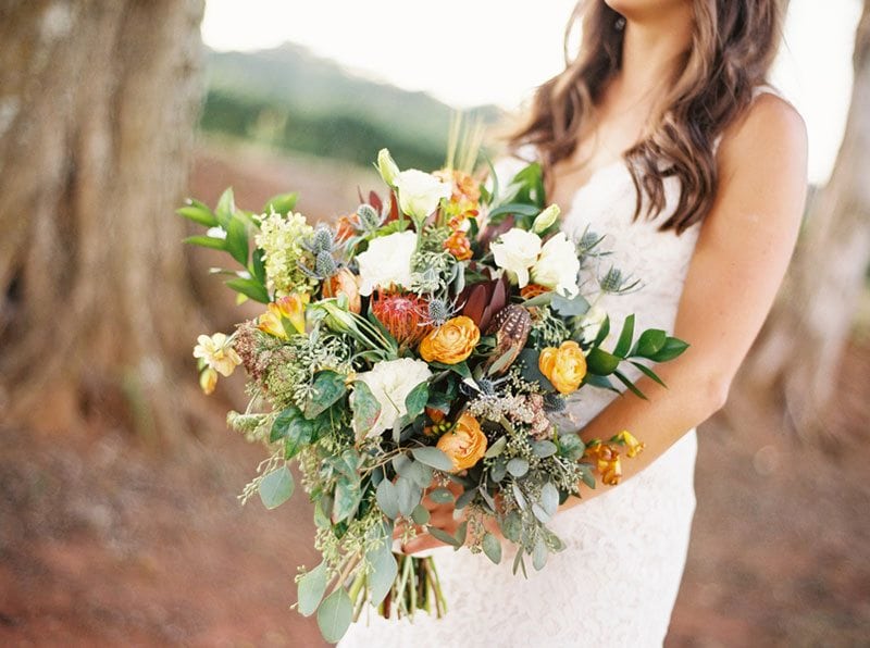 Autumn Bride Holding Flowers