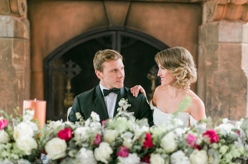 Chic And Modern Bride And Groom At Table