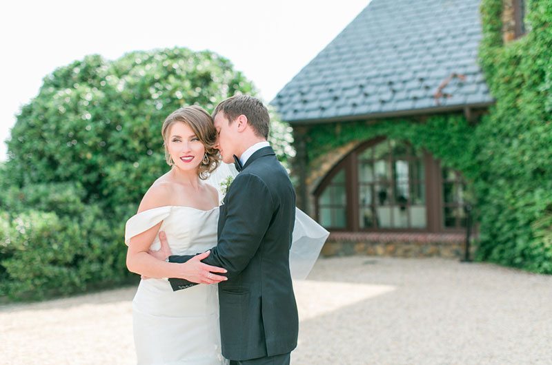 Chic And Modern Bride And Groom In Front Of House
