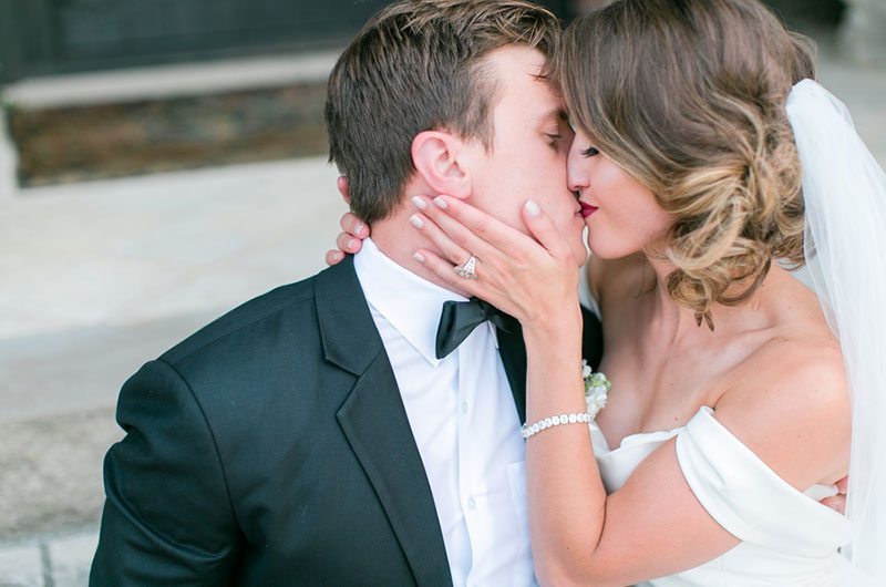 Chic And Modern Bride And Groom Kissing