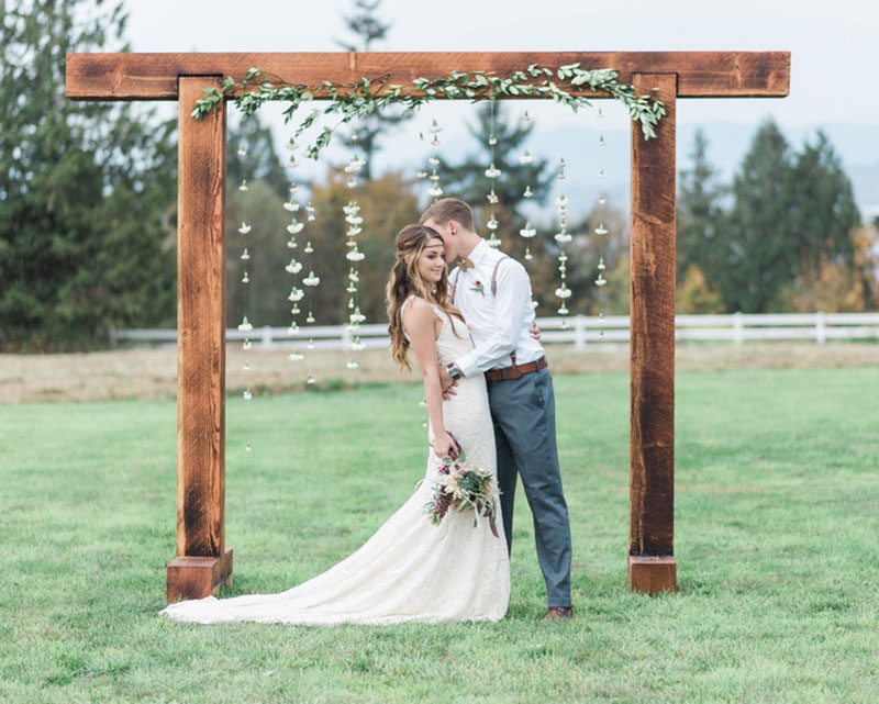 Countryside Bride And Groom Hugging