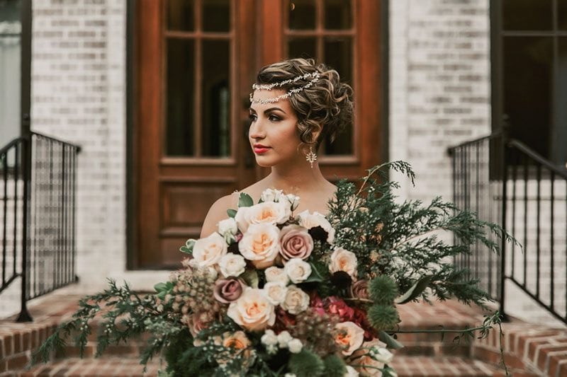 Gatsby Bride Holding Flowers