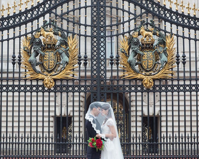London Bride And Groom In Front Of Gate