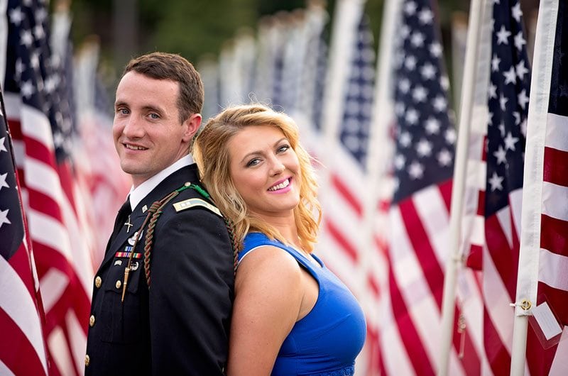 Patriotic Bride And Groom In Between Flags