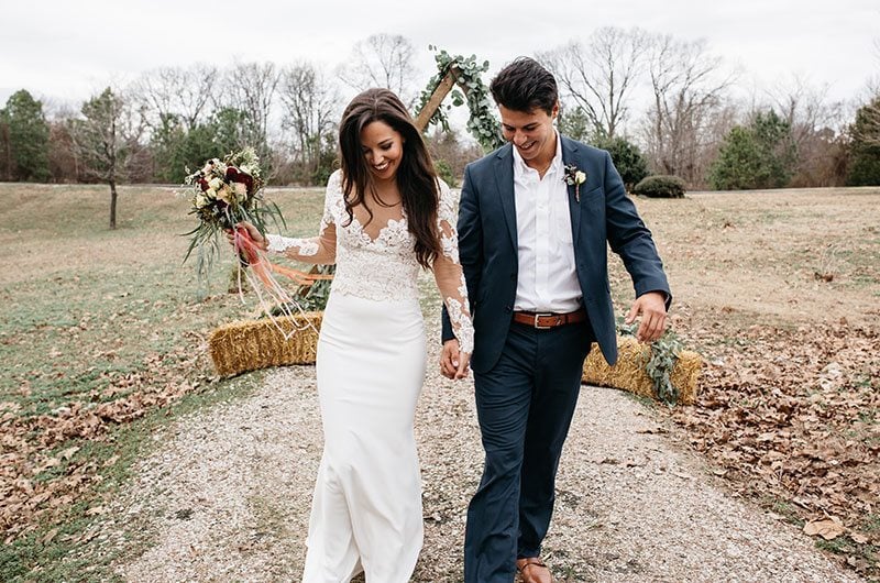 Timeless Territory Bride And Grooms Holding Hands