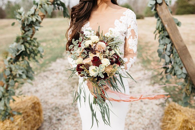 Timeless Territory Bride Holding Flowers