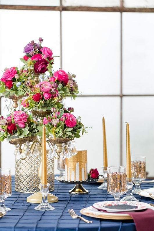 Vintage Copper Flowers On Table With Gold Candle