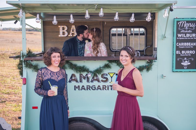 Charleston Christmas Wedding Food Truck With Kissing Bride And Groom