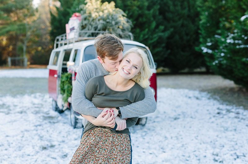 Merry Christmas Engagement Session Kissing Bride