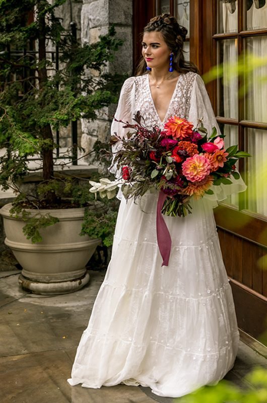 Spanish Inspired Wedding Dress Front With Bouquet
