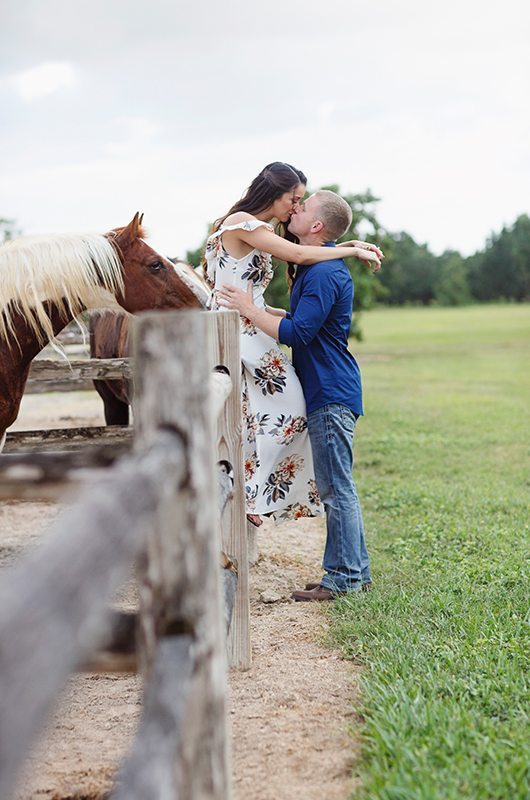 Cozy Country Engagement Session Couple On Fence