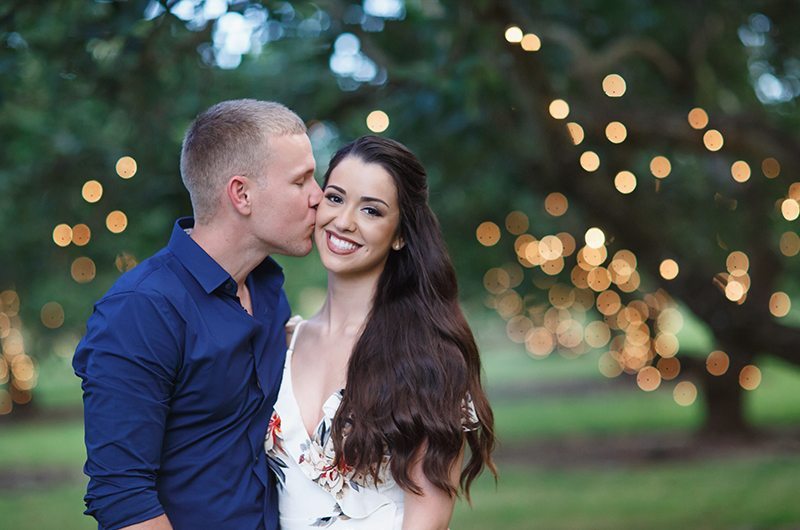 Cozy Country Engagement Session Groom Kissing Bride