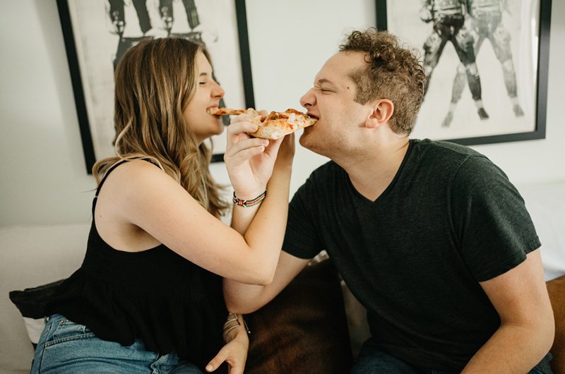 Unique Nashville Engagement Couple Eating Pizza