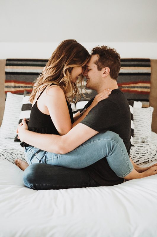 Unique Nashville Engagement Couple On Bed