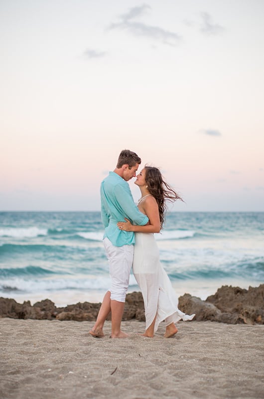 Patriotic Engagment Shoot Beach Looking At Each Other