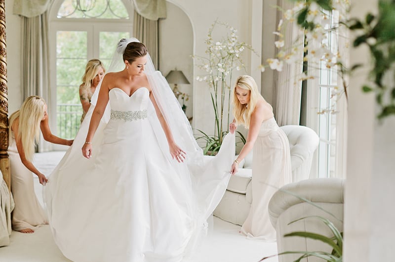 Mattie Jackson Wedding Getting Ready Adjusting Dress