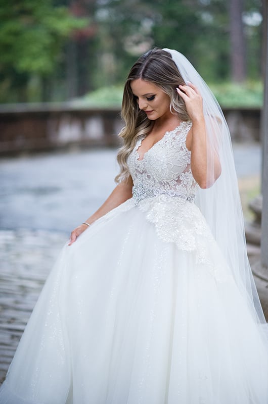 Casey Holmes Getting Ready Bridal Portrait Looking Down