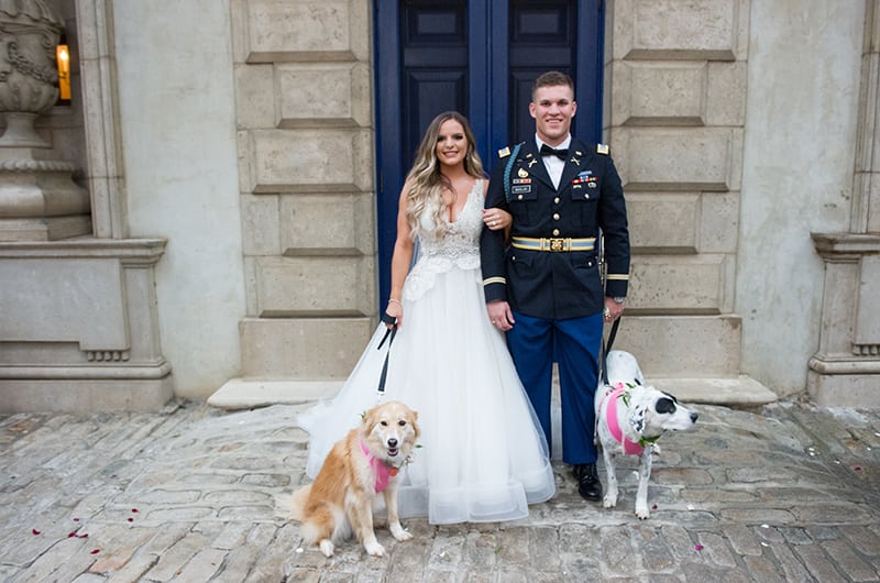 Casey Holmes Reception Posing With Dogs