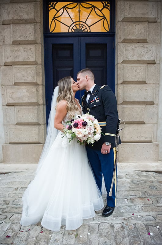 Casey Holmes Wedding Ceremony Door Kiss