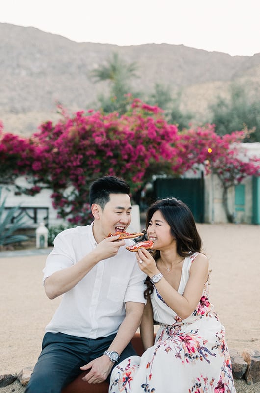 Kim Ye Engagement Portrait Eating Pizza Looking At Each Other