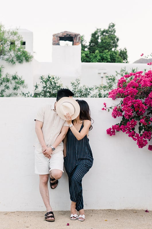 Kim Ye Engagement Portrait Kissing Behind Hat