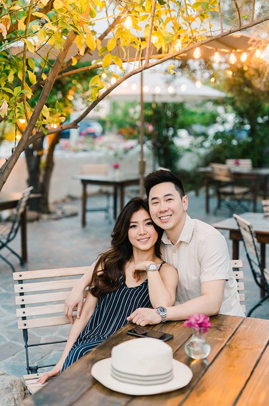 Kim Ye Engagement Portrait Leaning On Table