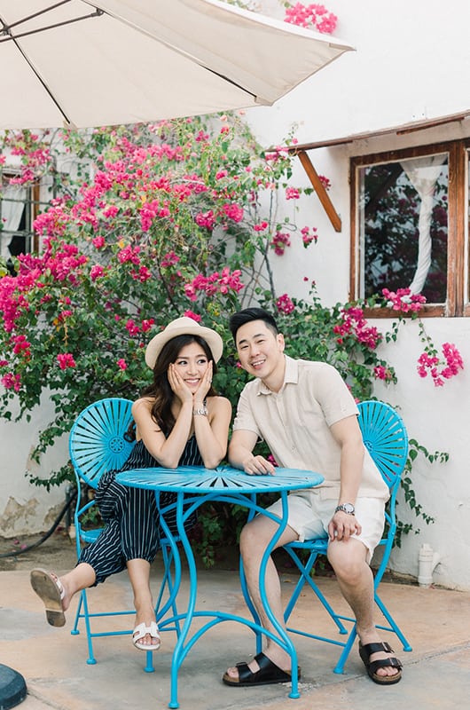 Kim Ye Engagement Portrait Sitting In Blue Chairs