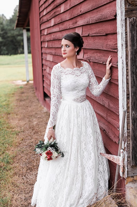 Marissa Bridal Portraits Against The Barn Looking Over