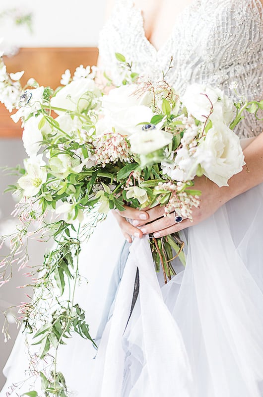 Styled Workshop Holding Flowers