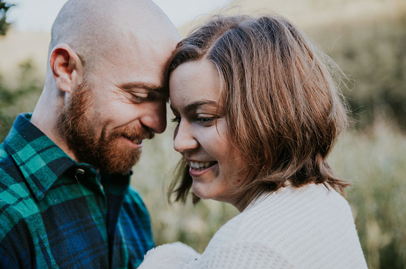 Dreamy Pumpkin Patch Engagement Photoshoot Close Up Couple