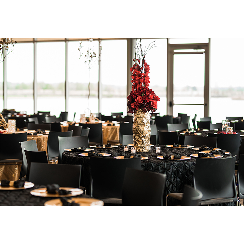 Lauryn Ware and Daniel Webber Reception Dinner Tables Draped in Black Golden Vase Red Flower Centerpiece