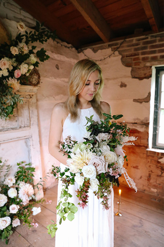 Emily And Justin Emily In Cabin Holding Bouquet