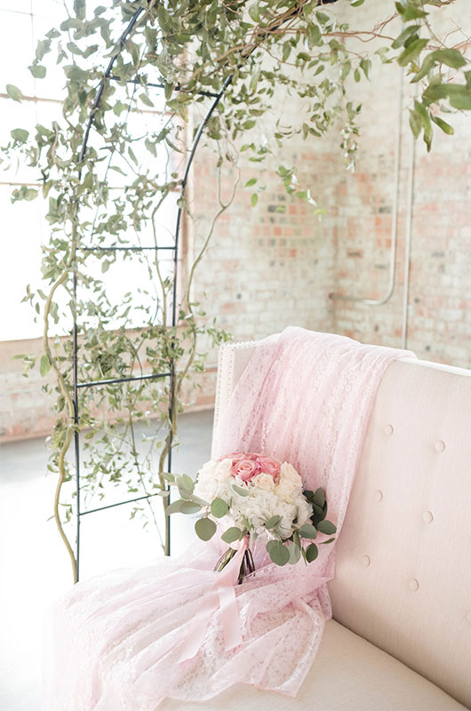 Pastel And Watercolor Styled Shoot Couch And Floral Detail
