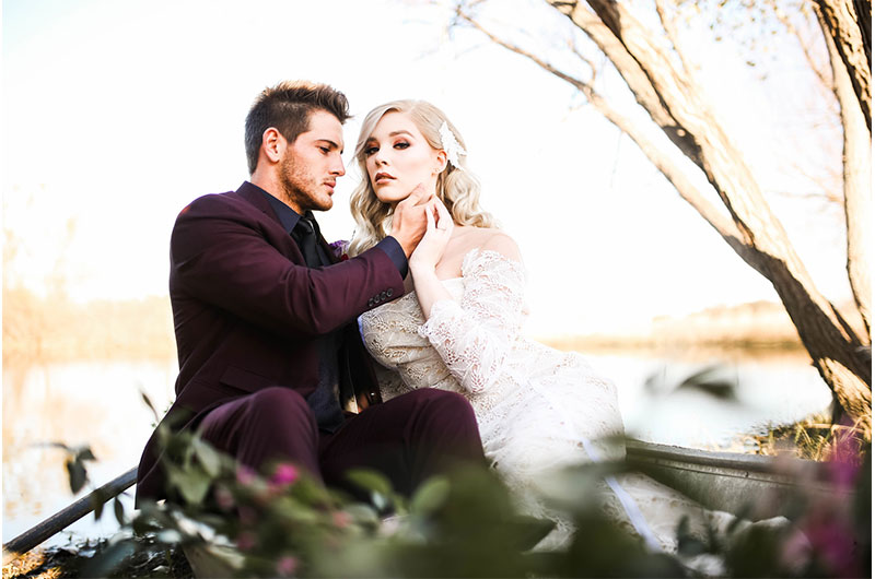 Woodsy Jewel Toned Shoot Couple In Boat Wideshot