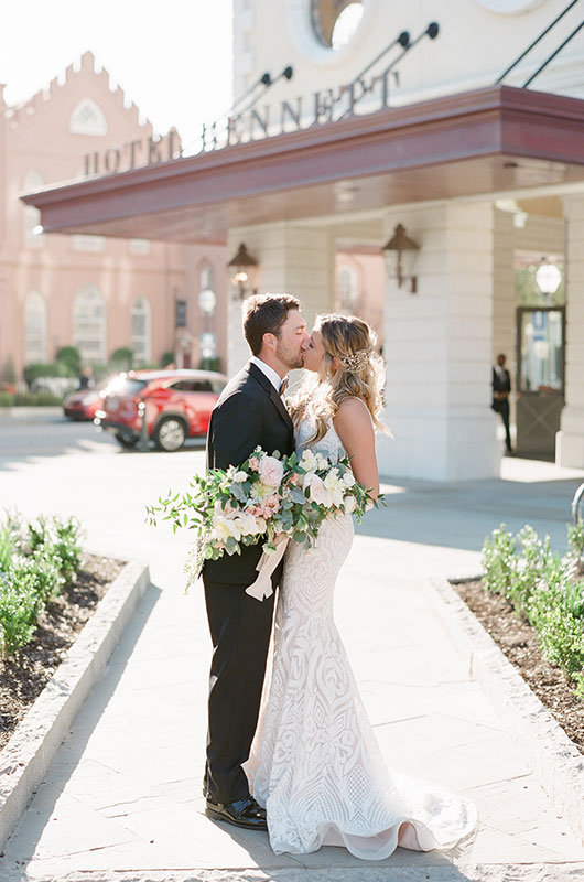 Part II The First Real Weddings At Charlestons Hotel Bennett Make Their Debut Couple Kissing In Front Of Hotel