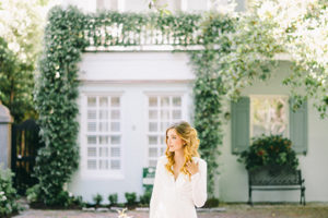 Historic Charleston Bridal Shoot On Rainbow Row Bride With Simple Dress In Front Of House