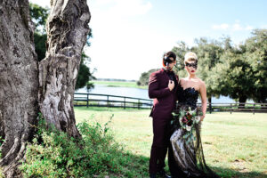 A Wicked Affair In Dade City Bride And Groom In Front Of Lake