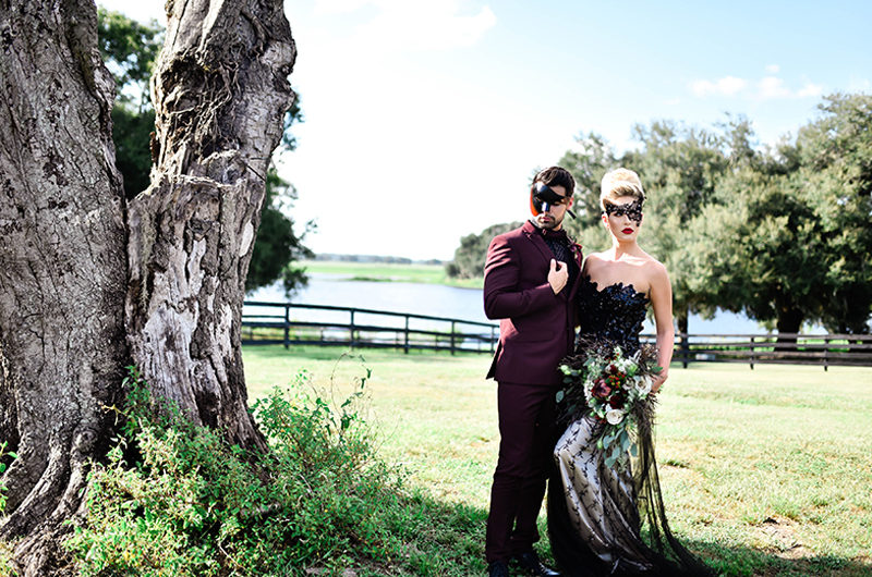 A Wicked Affair In Dade City Bride And Groom In Front Of Lake