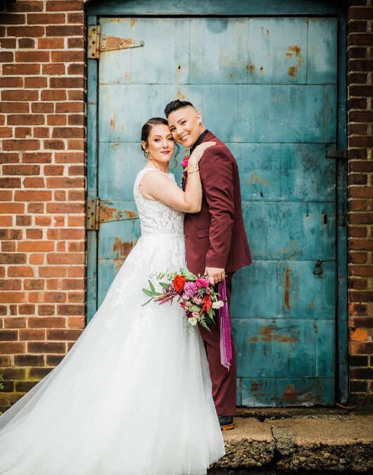 A Merry & Bright Winter Wedding Shoot Couple Both Looking At Camera