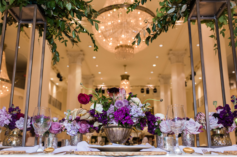Show Us The Pretty Bridal Extravaganza Wows Atlanta Purple Flower Arrangement Table Decor