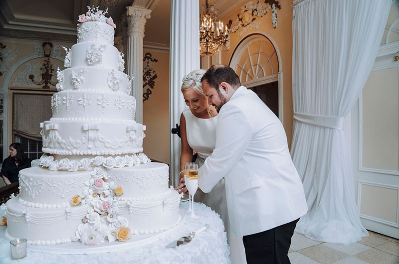 Salt Style & Events Presents Newlyweds HIllary & Brandon Couple Cutting Cake