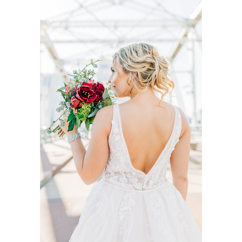 The Horton SoBro Bride Smelling Flowers