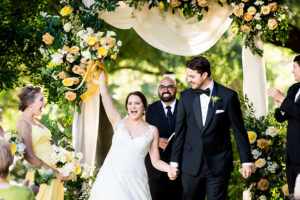 Carlota And Austins Spring Wedding Is A Breath Of Fresh Air Couple With Bouquet In Air