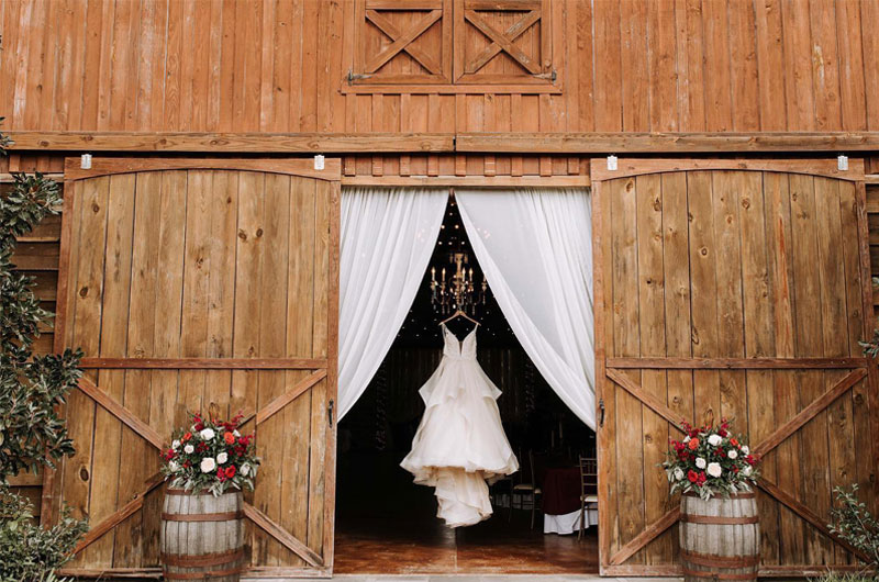 A Rustic And Elegant Barn Wedding In Bayou Country Dress Hanging With Venue Barn Doors