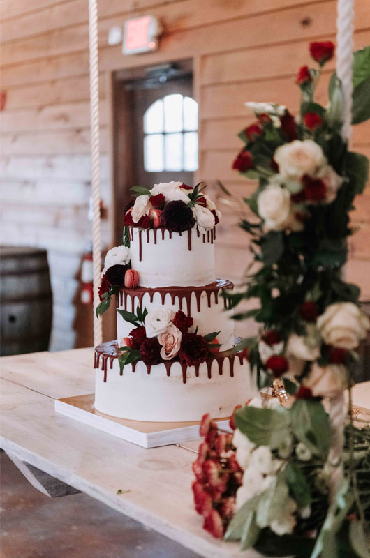 A Rustic And Elegant Barn Wedding In Bayou Country Wedding Cake With Florals