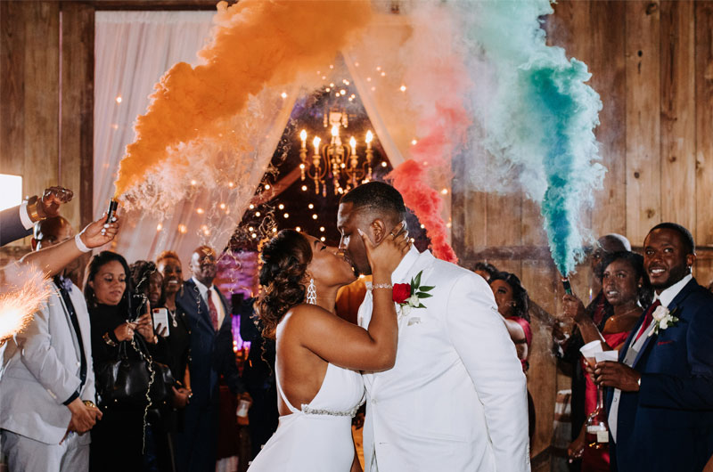 A Rustic And Elegant Barn Wedding In Bayou Country Wedding Reception Send Off With Color Powder