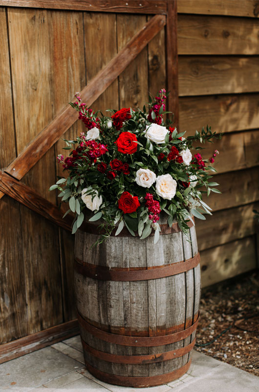 A Rustic And Elegant Barn Wedding In Bayou Country Wine Barrels With Florals And Barn