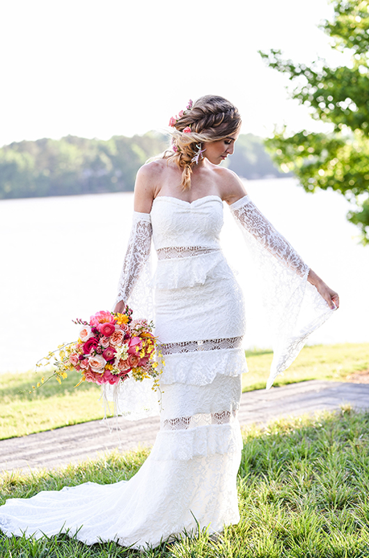 Radiant Bride Looking At Sleeve